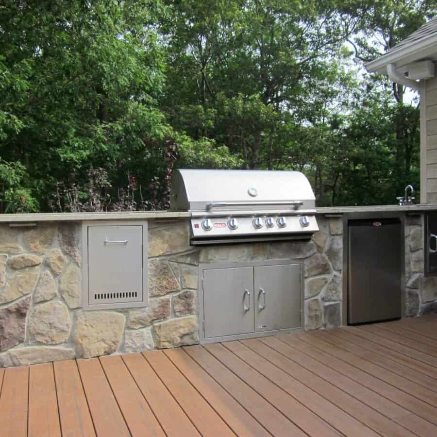 Outdoor Kitchen and granite countertop veneered in Dressed Field Stone - Bucks County - Hampton Bays, Long Island NY