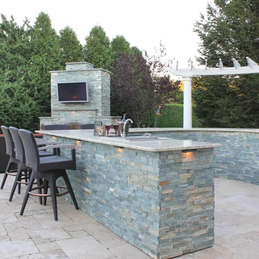 Outdoor Bar and Fireplace veneered in East West Stone - Bayside Waters - Southampton, Long Island NY