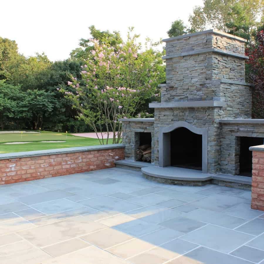 Natural Brick retaining wall with Rock Faced Bluestone Cap - Old Westbury, Long Island NY