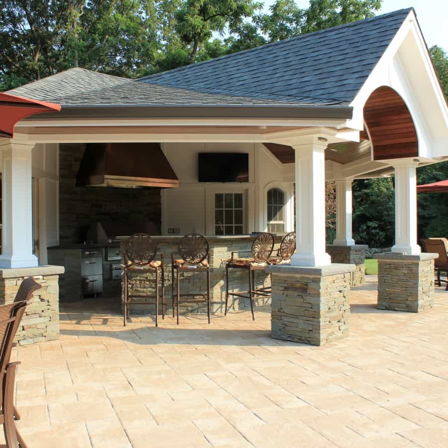 Stacked Bluestone Pillars and Outdoor Kitchen with Rock Faced Bluestone Cap - Old Westbury, Long Island NY