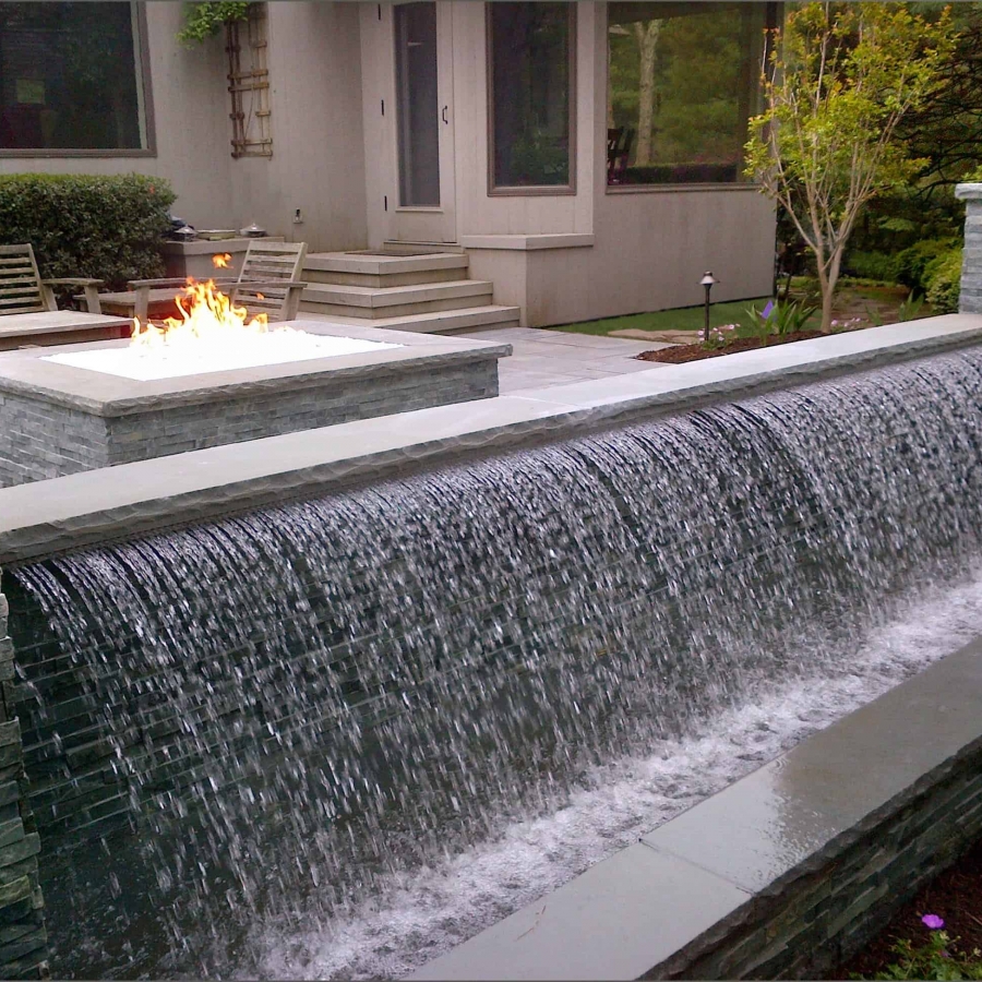 12' Sheer Descent water feature with Bluestone Caps and Real Stone System Veneer - East Hampton, Long Island NY