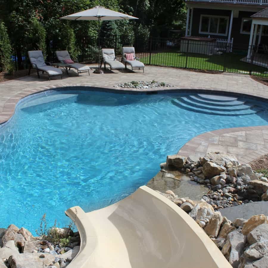 24' x 35' Free Form Gunite Pool with custom bench, slate tile, and Big Ride Slide - Woodbury, Long Island NY