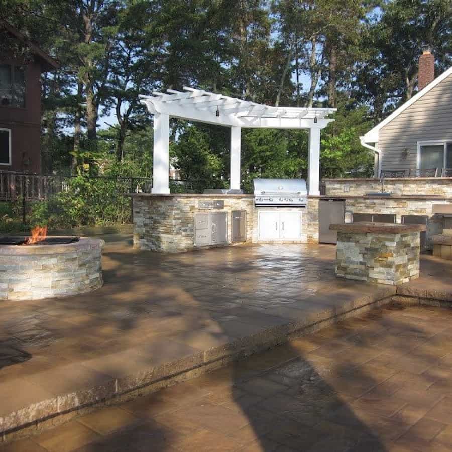Fire Pit Veneered with East West Stone Veneer- Honey Gold - and capped with Rainbow Stone with rock faced Edge - Flanders, Long Island NY